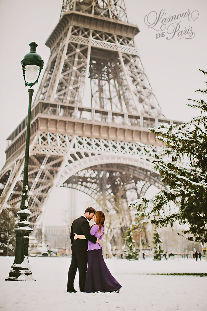 ppaz-preview Romantic portrait session of Abigail Wilder Boatwright and Zach Boatwright in snow covered Paris near the Eiffel Tower by Paris wedding photographer Stacy Reeves for L