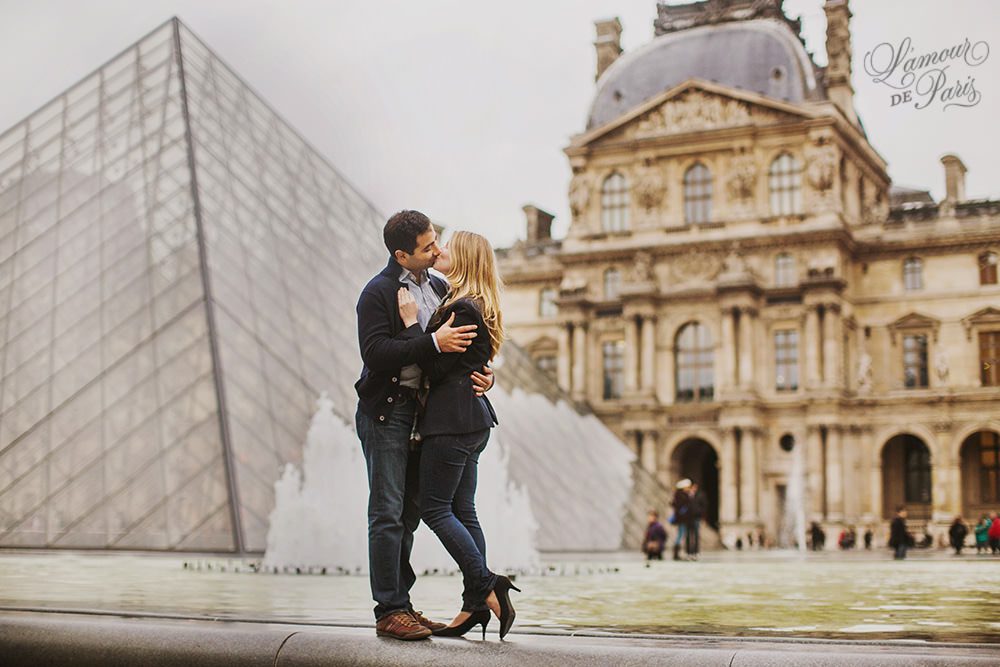 Romantic photo session of Allison and Ahmed around the Louvre and other historic landmarks of the City of Love by Paris portrait photographer Stacy Reeves for L'Amour de Paris photography studio.