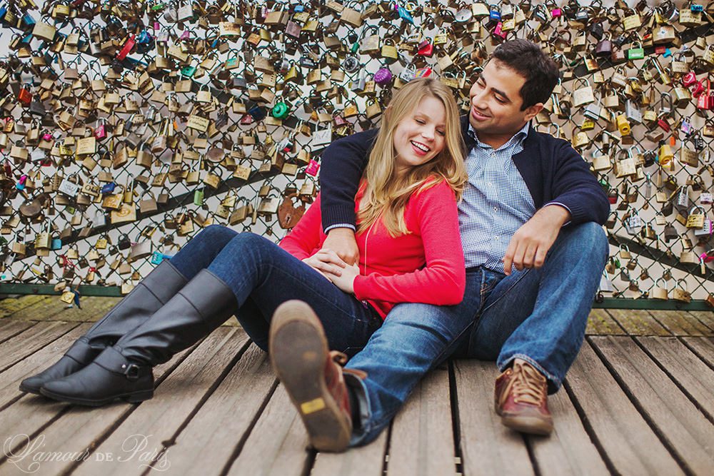 Romantic photo session of Allison and Ahmed around the Pont des Arts love lock bridge and other historic landmarks of the City of Love by Paris portrait photographer Stacy Reeves for L'Amour de Paris photography studio.