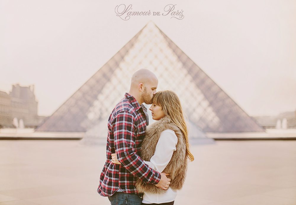 Romantic portraits of Helen and Sam Byrd is front of the Musee du Louvre by Paris wedding photographer Stacy Reeves for L'Amour de Paris blog