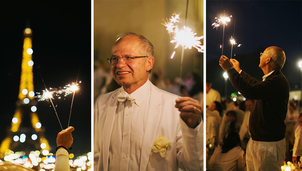 Diner en Blanc, also known as Diner in White, a top secret invitiation-only flash mob in Paris, France where 11,000 people dressed entirely in white clothes spontaneously set up tables and chairs in front of historic landmarks one night a year. The 2013 Diner en blanc, held on July 13, took place in the Louvre courtyard and by the Trocadero fountains in front of the Eiffel Tower. Photographed by Paris wedding and portrait photographer Stacy Reeves for vacation planning blog L'Amour de Paris.