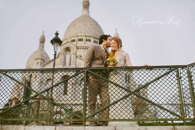 Photographs of a couple eloping in Paris at Sacre Coeur church in Montmartre by Paris wedding photographer Stacy Reeves for portrait photo studio and vacation planning blog L'Amour de Paris.