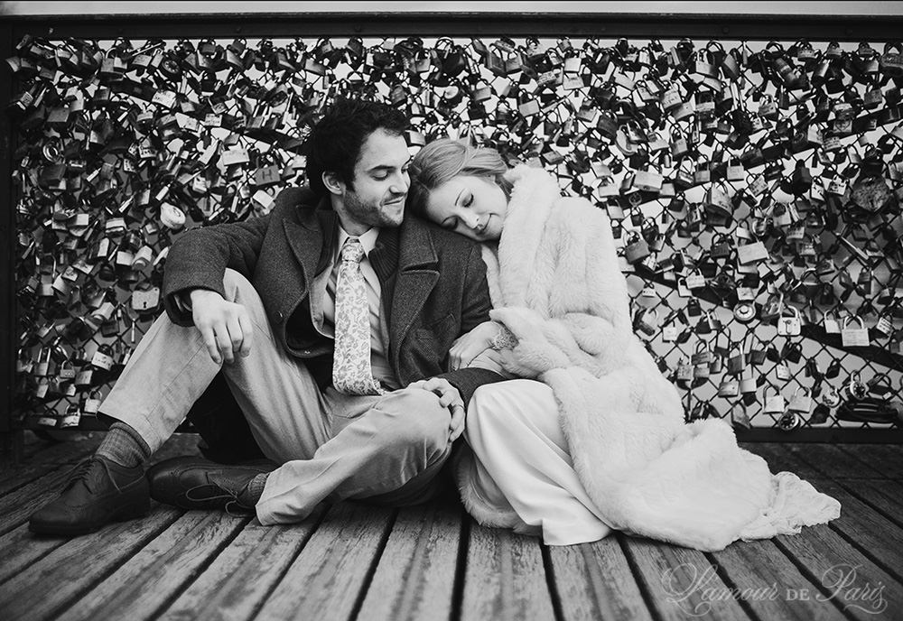 Photographs of a couple eloping in Paris and placing love locks on the Pont des Arts bridge by Paris wedding photographer Stacy Reeves for portrait photo studio and vacation planning blog L'Amour de Paris.