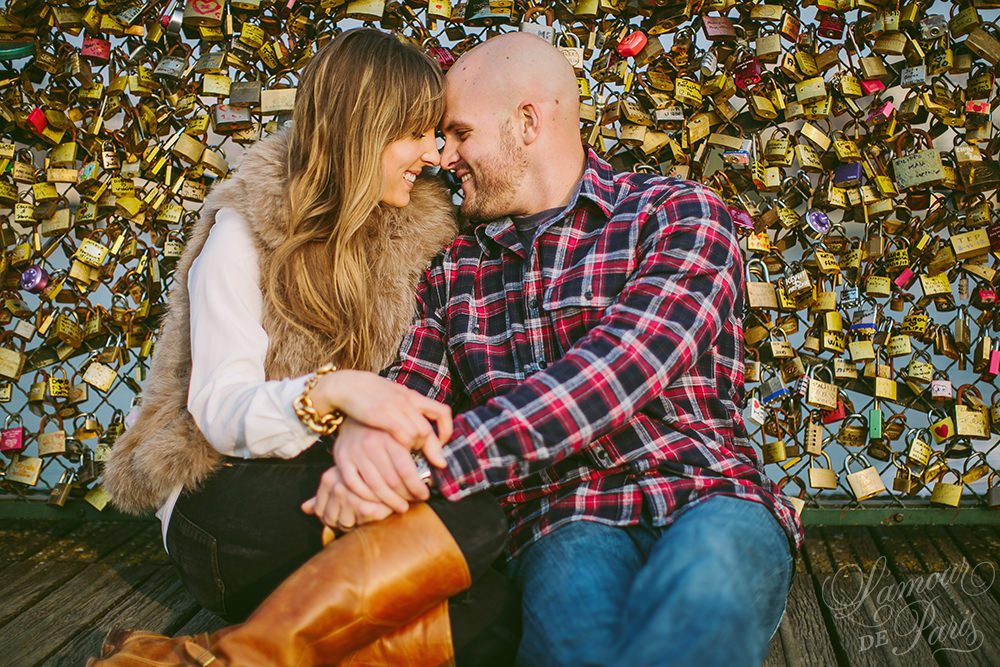 Romantic portraits at the Louvre, Pont des Arts Bridge, and Seine River in Paris by wedding photographer Stacy Reeves
