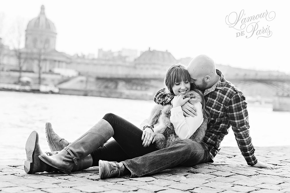 Romantic portraits at the Louvre, Pont des Arts Bridge, and Seine River in Paris by wedding photographer Stacy Reeves