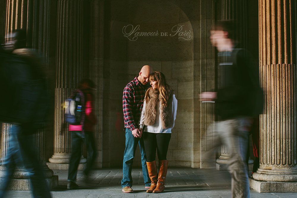Romantic portraits at the Louvre, Pont des Arts Bridge, and Seine River in Paris by wedding photographer Stacy Reeves
