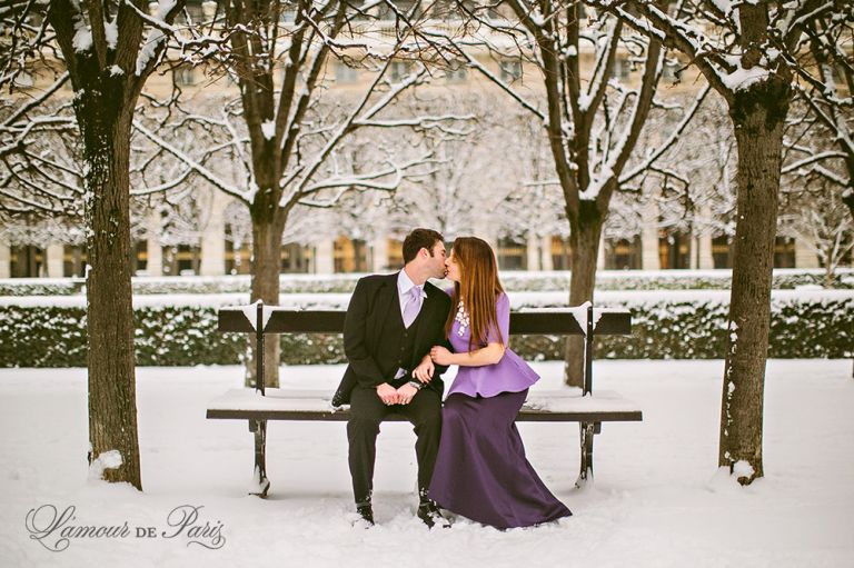 Couples portrait session at the Louvre in Paris during snow in winter