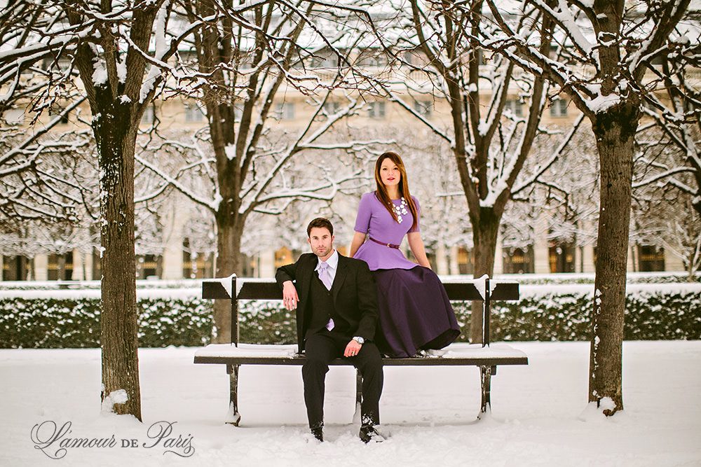 Couples portrait session at the Louvre in Paris during snow in winter