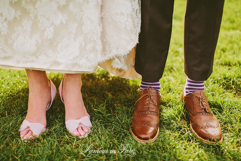 Paris elopement wedding ceremony at the Eiffel Tower, portrait photography at the Pont Alexandre III, Notre Dame de Paris, Pont des Arts love lock bridge, and a first dance and cake cutting at the Louvre at night. Photography by Stacy Reeves for destination wedding blog Lamour de Paris.
