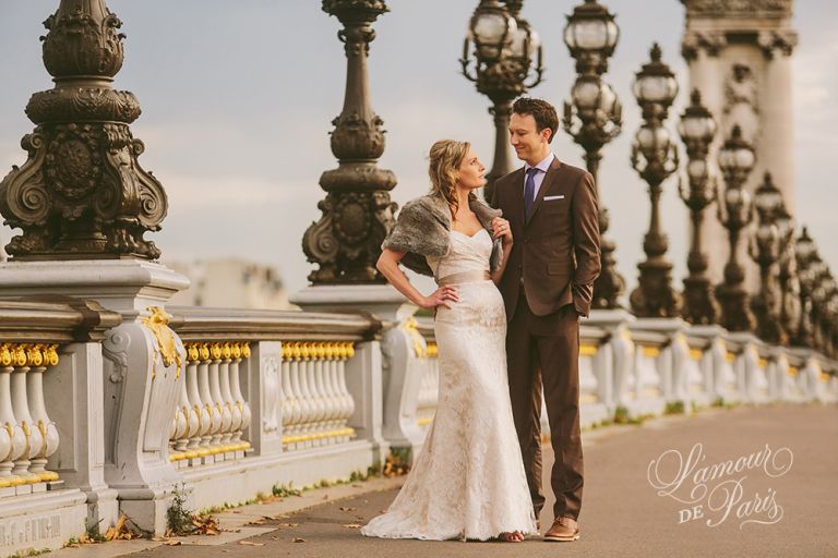 Paris elopement wedding ceremony at the Eiffel Tower, portrait photography at the Pont Alexandre III, Notre Dame de Paris, Pont des Arts love lock bridge, and a first dance and cake cutting at the Louvre at night. Photography by Stacy Reeves for destination wedding blog Lamour de Paris.