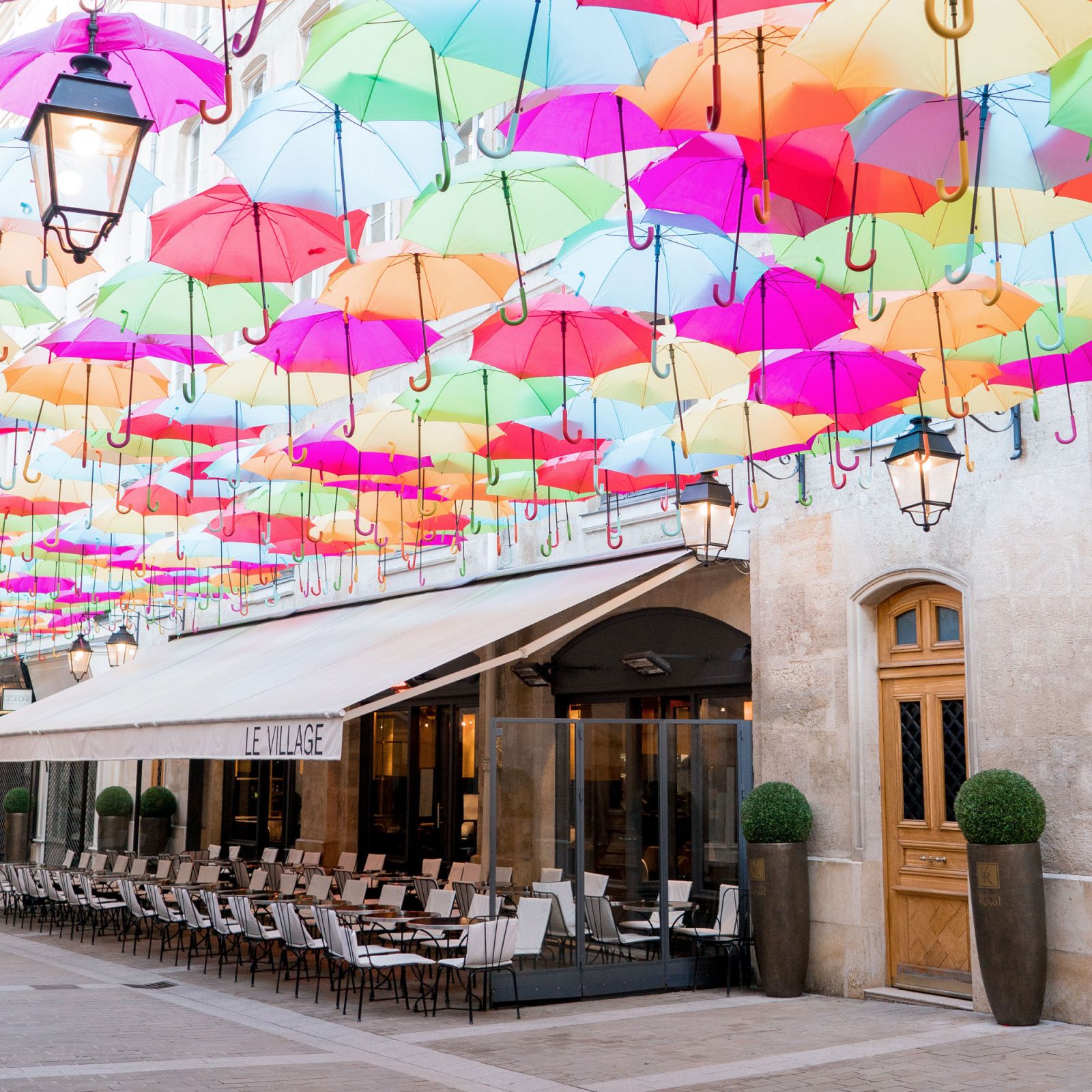 village royal umbrellas and cafe