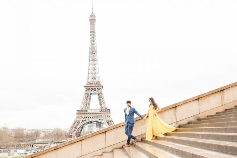 paris maternity photos at trocadero with yellow dress and blue suit