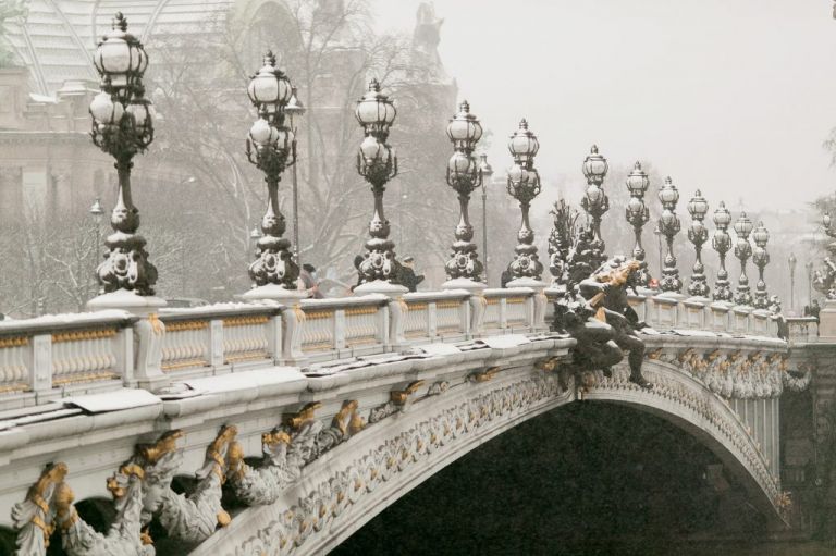 snow in paris at pont alexandre