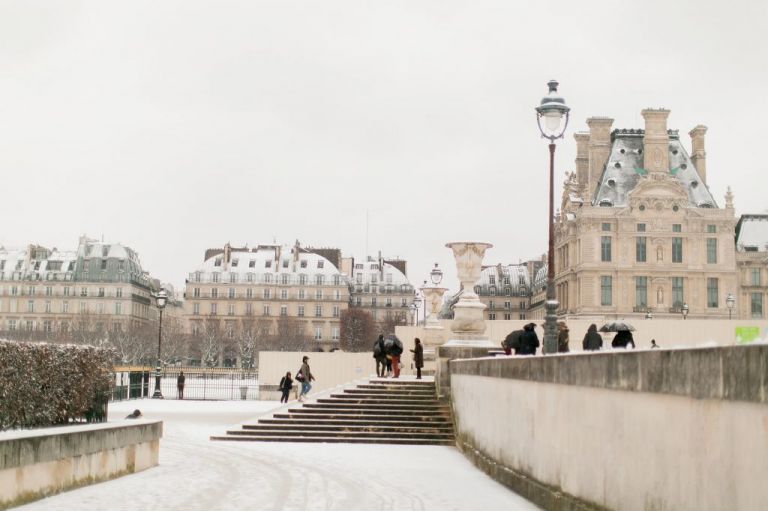 snow in paris at the tuilieries and lovure