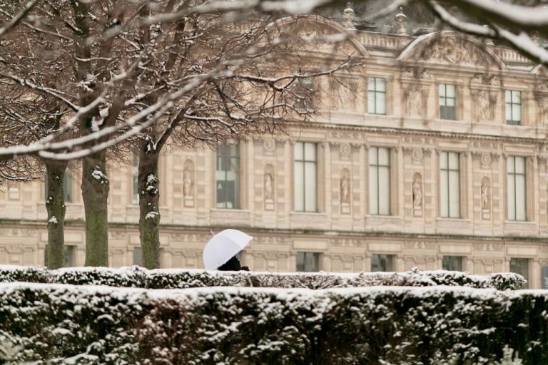 snow in paris at the louvre