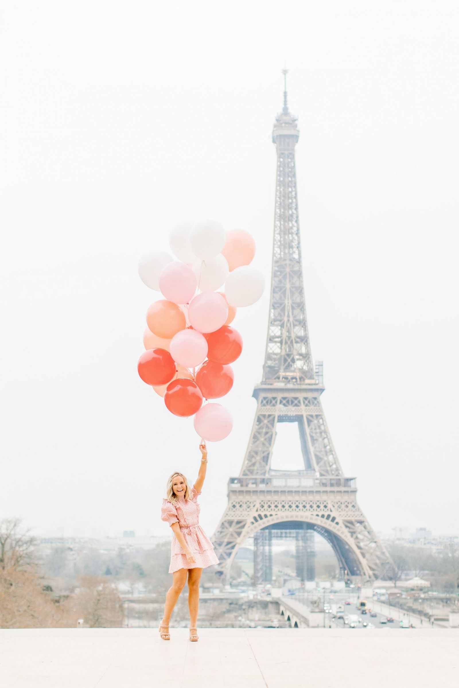 hello happiness blog author nashvilletash in Paris with balloons at eiffel tower