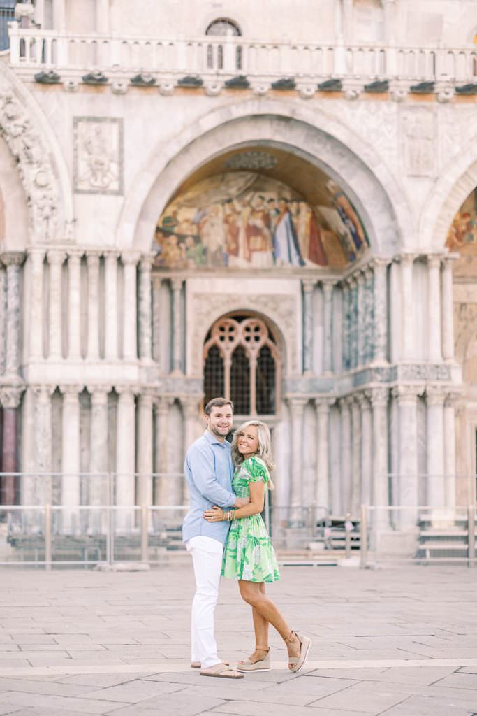 couple taking a portrait in saint marks square in venice
