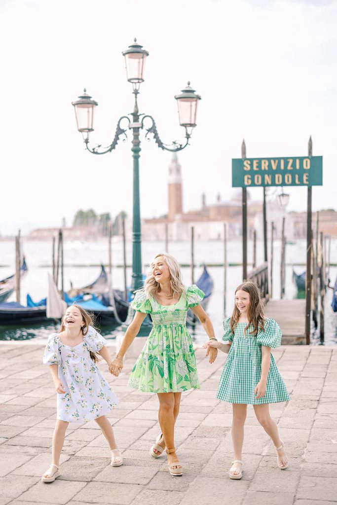 mom and children laughing together in Venice
