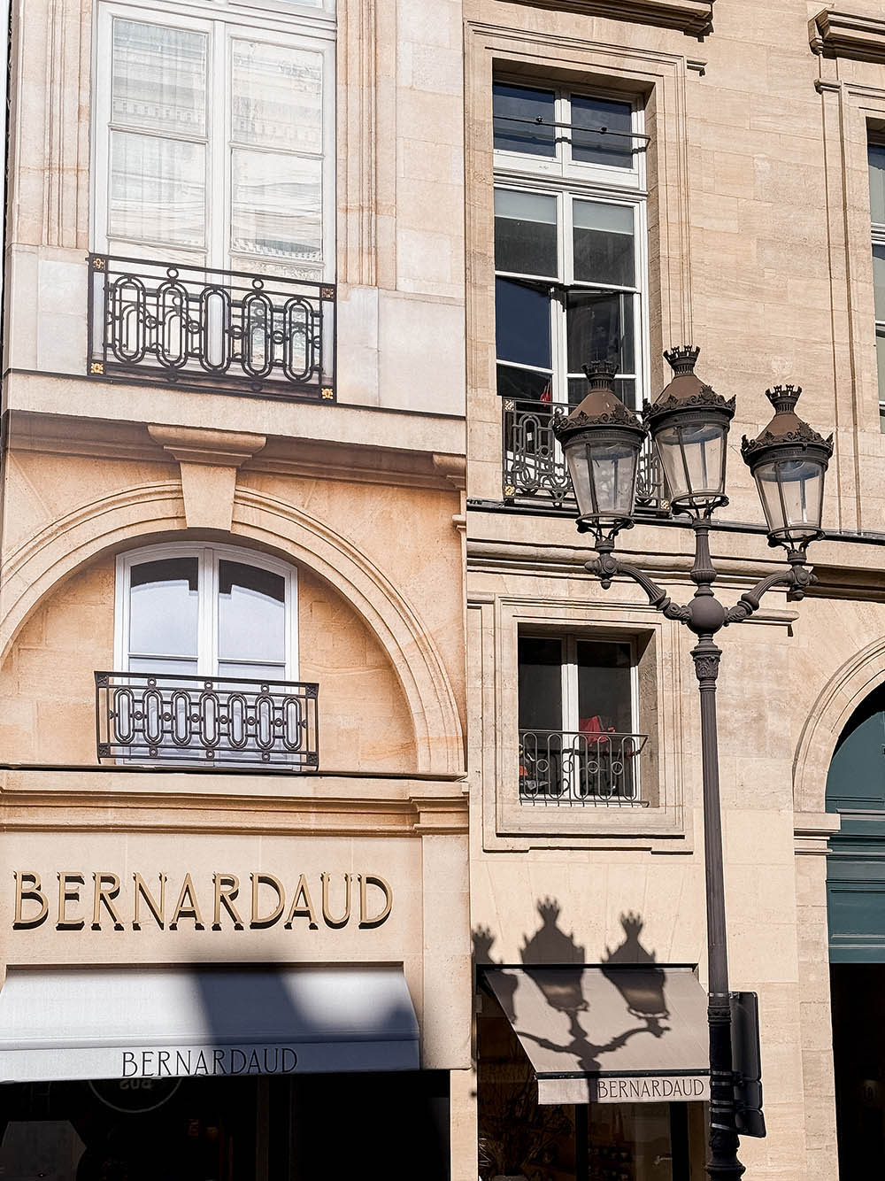 paris lamps shadow seen from paris hop on hop off bus tour
