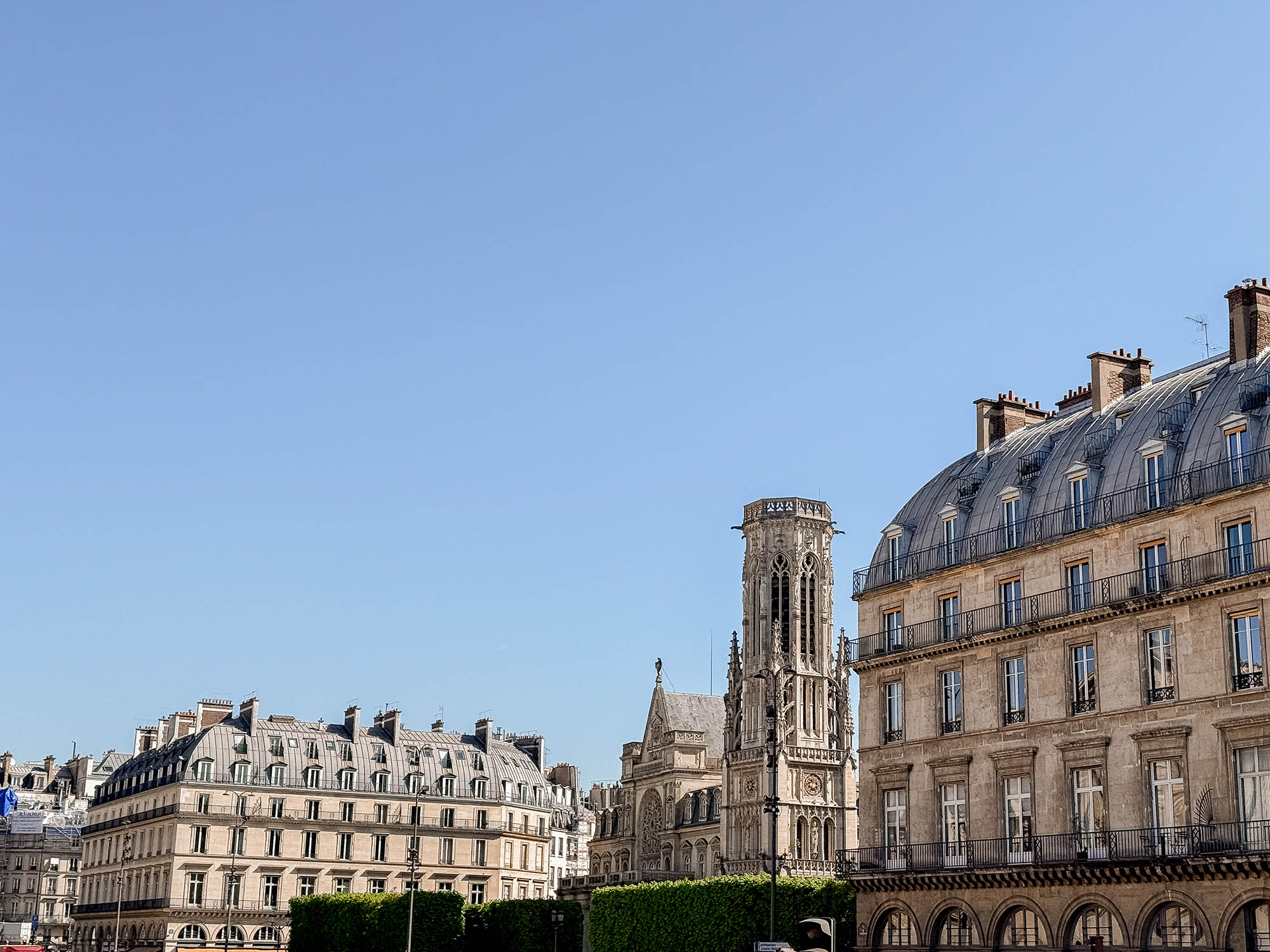 paris cityscape seen from paris hop on hop off bus tour