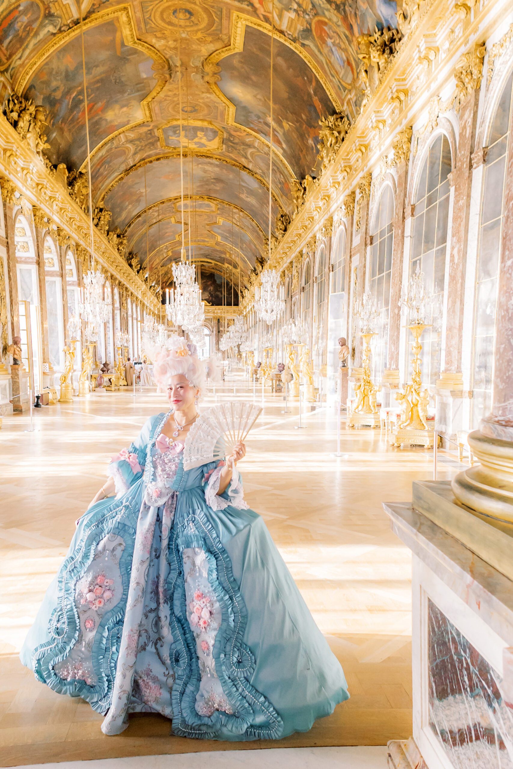 Unforgettable portrait taken in the Hall of Mirrors at the 2025 Versailles Masked Ball.