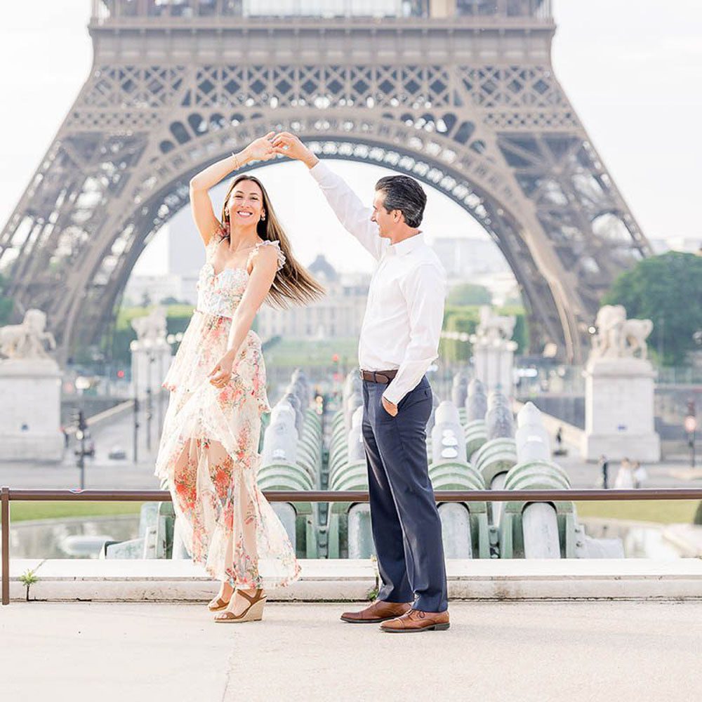 couple in front of the Eiffel Tower Trocadero